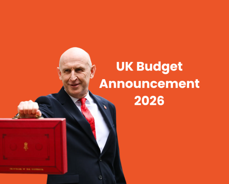 John Healey holding the red budget announcement briefcase